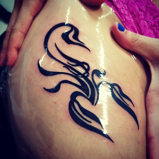 Explore music tattoo ideas male, creative tattoo ideas in Buffalo, available at Wishful Inking Tattoos & Piercings