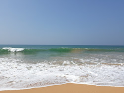 Foto di Maha Induruwa Beach con dritto e lungo