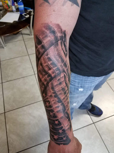 Explore barn owl tattoo ideas, creative tattoo ideas in Gillette, available at Felony Ink Tattoos