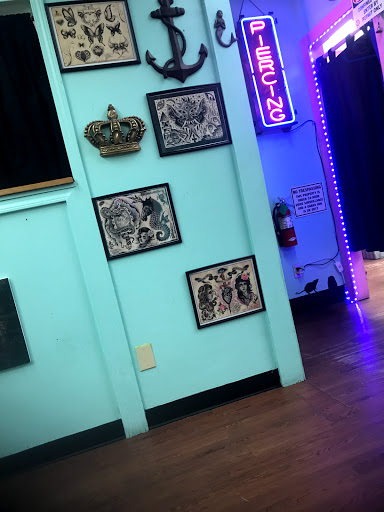 Explore cover up tattoo ideas for shoulder, creative tattoo ideas in Lafayette, available at Crown & Anchor Tattoos