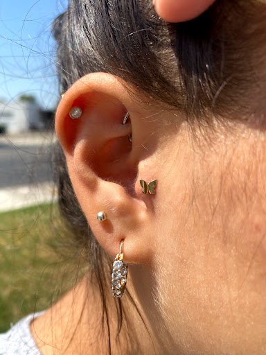 Find tattoo ideas crown for your next unique tattoo in Visalia at La Luna Piercings and Fine Jewelry