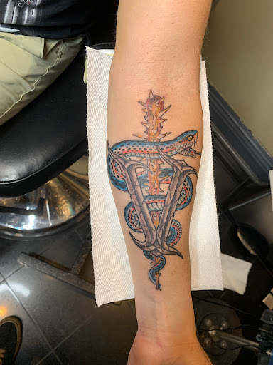 Explore husband wife matching tattoo ideas, creative tattoo ideas in Massapequa, available at Kings Avenue Tattoo