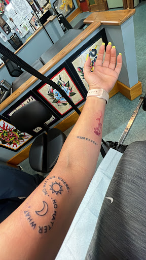 Explore axe tattoo ideas, creative tattoo ideas in New Orleans, available at Tattooagogo