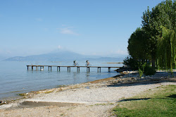 Foto von Spiaggia Punta Gro und die siedlung