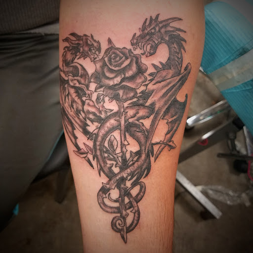 Explore justice tattoo ideas, creative tattoo ideas in Kingsport, available at Ink-a-zoid Tattoos & Piercings