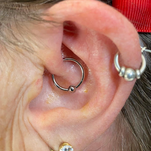 Explore happiness tattoo ideas, creative tattoo ideas in San Antonio, available at Adrenaline Tattoo & Body Piercing