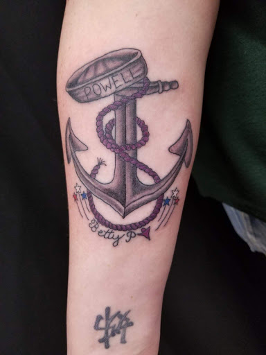 Explore electricity tattoo ideas, creative tattoo ideas in Galesburg, available at Hawks Tattoos