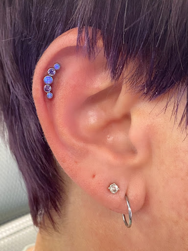 Explore back of leg tattoo ideas, creative tattoo ideas in Springfield, available at Body Piercing By Qui Qui