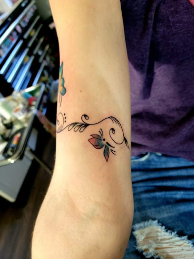 Find rooster tattoo ideas for your next unique tattoo in Warrensburg at Altered Visions Tattoo Studio