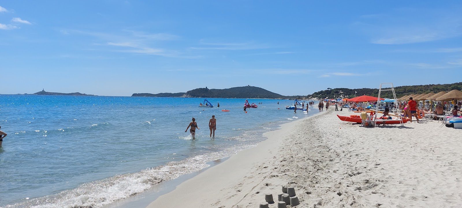 Foto av Spiaggia di Simius med lång rak strand