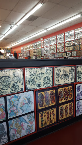 Explore cover up tattoo ideas on hand, creative tattoo ideas in Greeley, available at BLOOD AND IRON TATTOO
