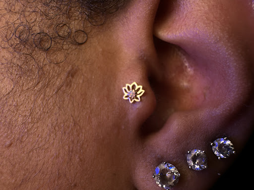 Explore stomach tattoo ideas for guys, creative tattoo ideas in Waterbury, available at Jay Makes Holes