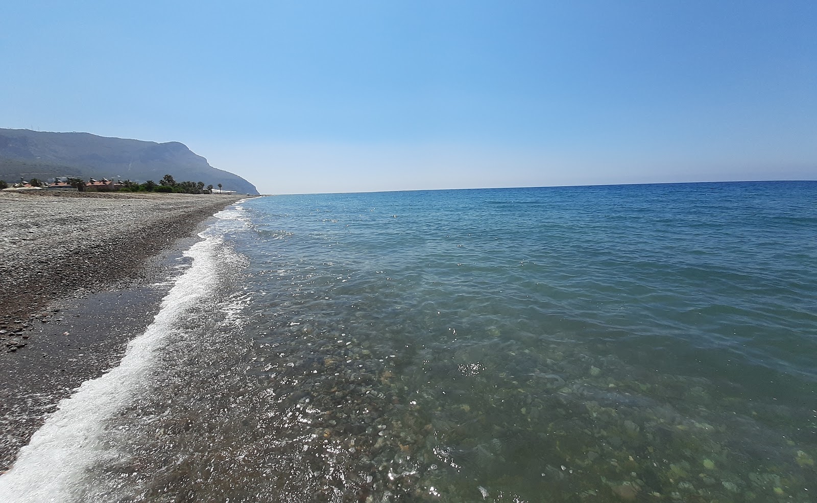 Foto de Tekeli beach con guijarros beige superficie