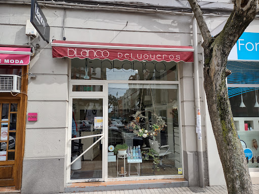 Blanco Peluqueros en León, León