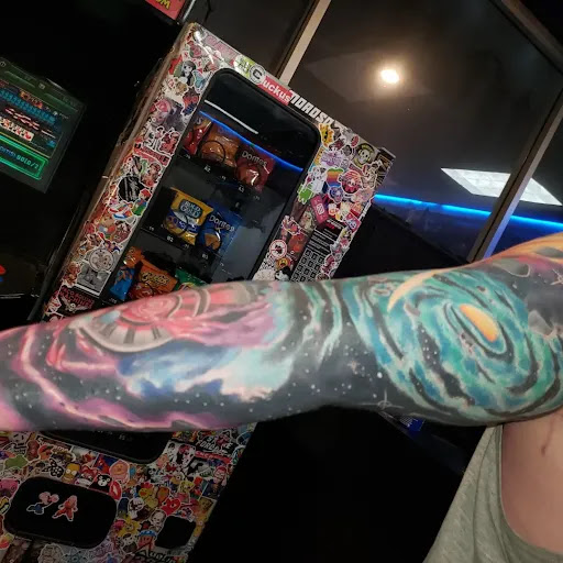 Explore silver lining tattoo ideas, creative tattoo ideas in Pearland, available at Black List Tattoo & Piercing Co.