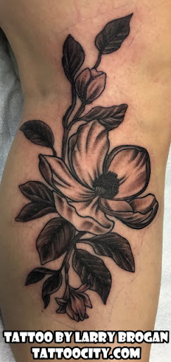 Explore stomach tattoo ideas for women, creative tattoo ideas in Lockport, available at Tattoo City by Larry Brogan