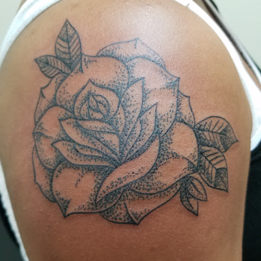 Explore female lion tattoo ideas, creative tattoo ideas in Cedar Creek, available at Inkd Out Tattoos