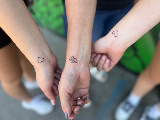 Explore daddy daughter tattoo ideas, creative tattoo ideas in Denver, available at Certified Tattoo Studios