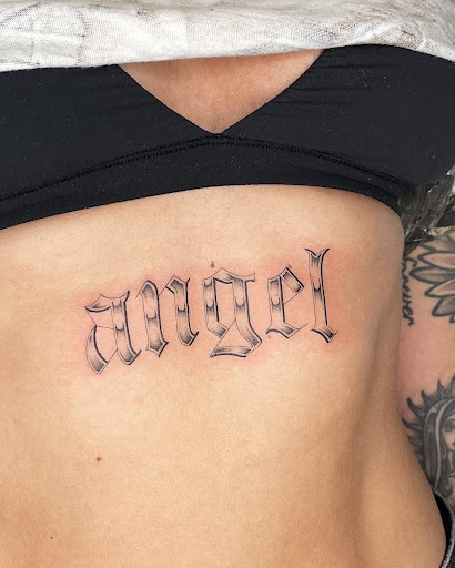 Explore bible verse tattoo ideas for guys, creative tattoo ideas in Los Angeles, available at KINK Tattoo