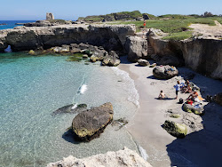 Spiaggia di Portulignu'in fotoğrafı küçük bir koy ile birlikte