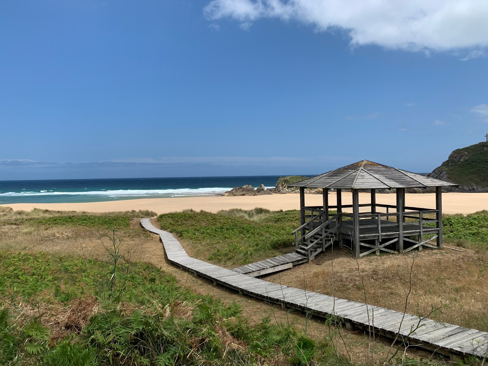 Photo of Praia de San Roman with turquoise water surface