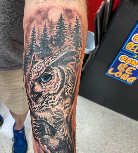Explore rattlesnake tattoo ideas, creative tattoo ideas in Houston, available at Rose & Dagger Tattoo
