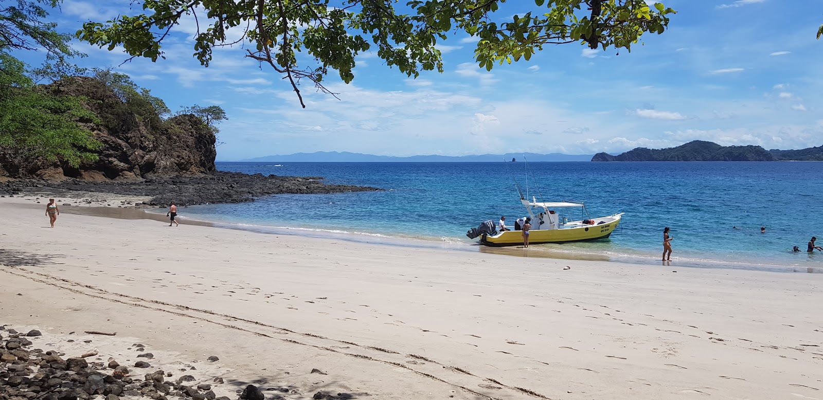 Foto de Playa Penca com areia bege superfície