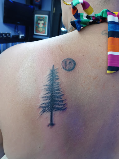 Explore knee tattoo ideas male, creative tattoo ideas in Crown Point, available at Tainted Skin & Who Dun It Piercing Salon