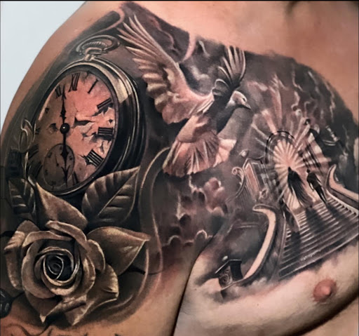 Explore december birth flower tattoo ideas, creative tattoo ideas in Fort Wayne, available at Grade A Tattoos and Body Piercing