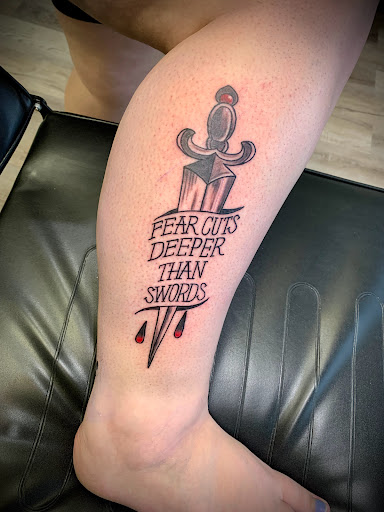 Explore grumpy bear tattoo ideas, creative tattoo ideas in Greensboro, available at Dogwood Ink