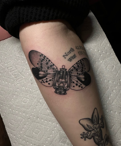 Find small tree tattoo ideas for your next unique tattoo in Lander at Blackblood Tattoo and Piercing