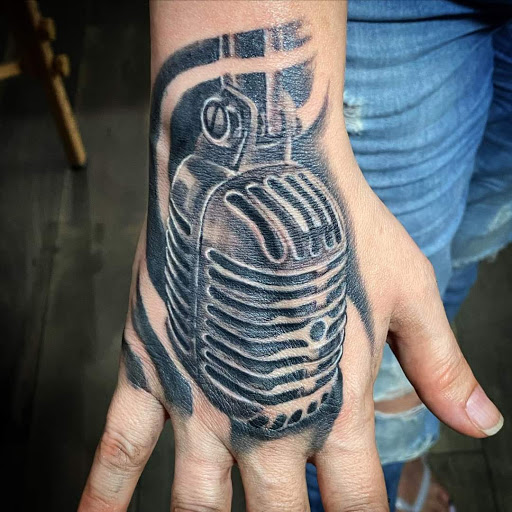 Explore mens tattoos on wrist ideas, creative tattoo ideas in Virginia Beach, available at World Famous Blue Horseshoe Tattoo and Piercing Independence