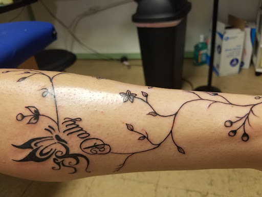 Explore face tattoos above eyebrow tattoo ideas, creative tattoo ideas in Nevada, available at Generation X Tattoos and Piercings