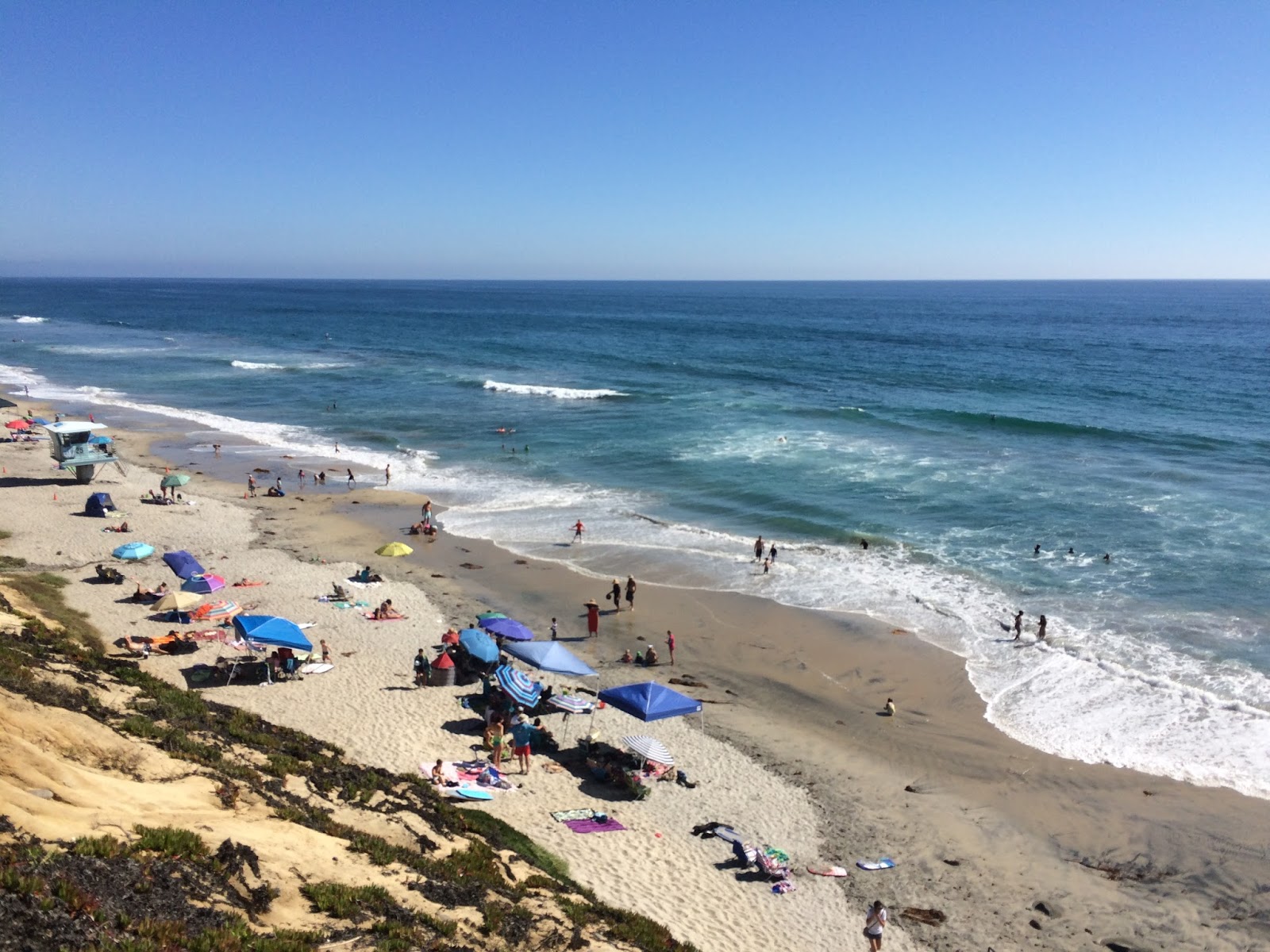 Photo of South Carlsbad beach with bright sand surface