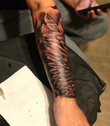 Explore mom name tattoo ideas for guys, creative tattoo ideas in Houston, available at Mafia Ink Tattoo and Piercing