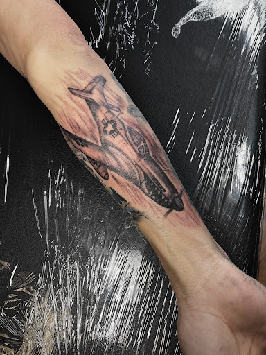 Explore flash tattoo ideas for guys, creative tattoo ideas in Fort Oglethorpe, available at The Helm Tattoo & Piercing