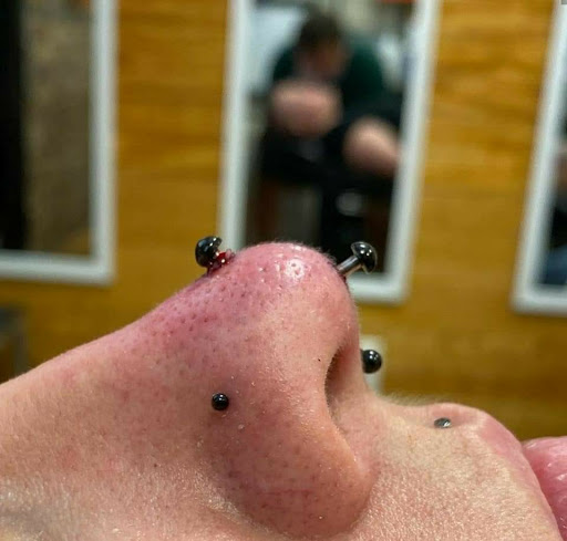 Explore papa bear tattoo ideas, creative tattoo ideas in Summerville, available at Exotic Impressions Body Piercing