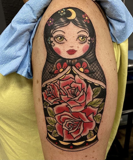 Explore campfire tattoo ideas, creative tattoo ideas in Olympia, available at Fleshworks Tattoo Studio