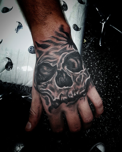 Explore matching father and son tattoo ideas, creative tattoo ideas in North Fort Myers, available at Loyal 2 The Coil Tattoos & Body Piercings