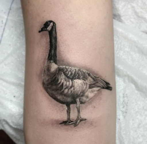 Explore neck tattoos for women ideas, creative tattoo ideas in East Lansing, available at Splash of Color Tattoo & Piercing Studio