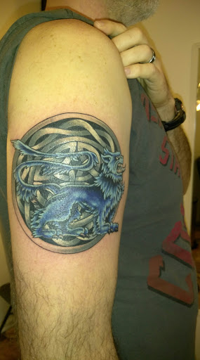 Explore fish tattoo ideas for men, creative tattoo ideas in Hebron, available at Explosive Ink Tattoo