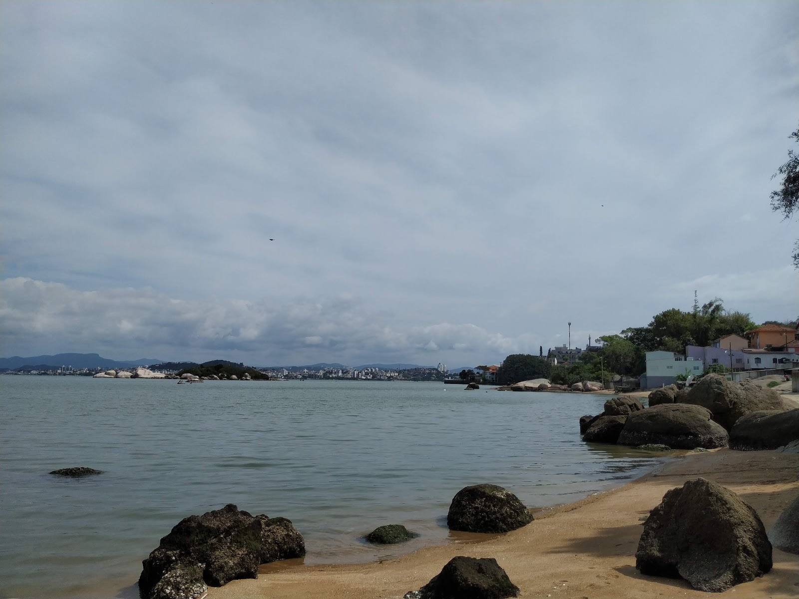 Fotografija Praia do Curtume in naselje