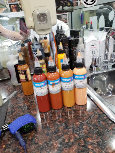 Explore flower tattoo ideas arm, creative tattoo ideas in Paterson, available at Addiction Tattoo