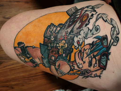 Explore tattoo ideas for women's lower back, creative tattoo ideas in Cincinnati, available at Black Fern Tattoo