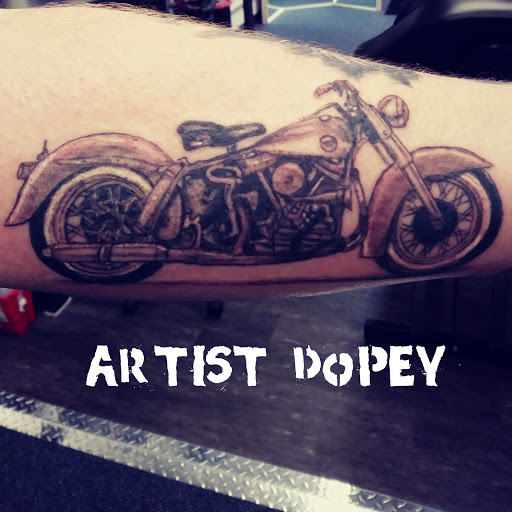 Explore road tattoo ideas, creative tattoo ideas in Kearney, available at Babalus Professional Tattoo Studio