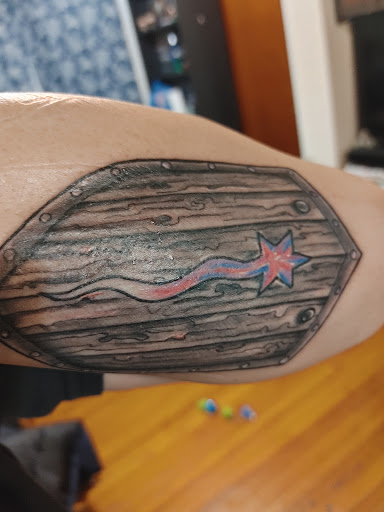 Explore river tattoo ideas, creative tattoo ideas in Albany, available at The Curly Wolf Tattoo Club