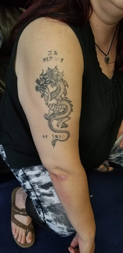 Explore chest cross tattoo ideas, creative tattoo ideas in Wheeling, available at SPFX Tattoo