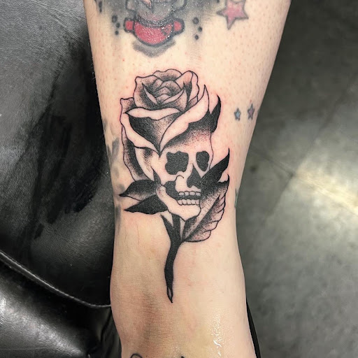 Explore tattoo ideas leg, creative tattoo ideas in Saint Paul, available at Black Coffin Tattoo