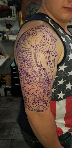 Explore elbow tattoo ideas traditional, creative tattoo ideas in Portsmouth, available at Hobos Tattoo