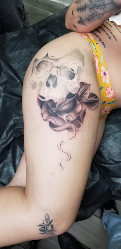 Explore guitar pick tattoo ideas, creative tattoo ideas in Glendale, available at Razteca Art Tattoo